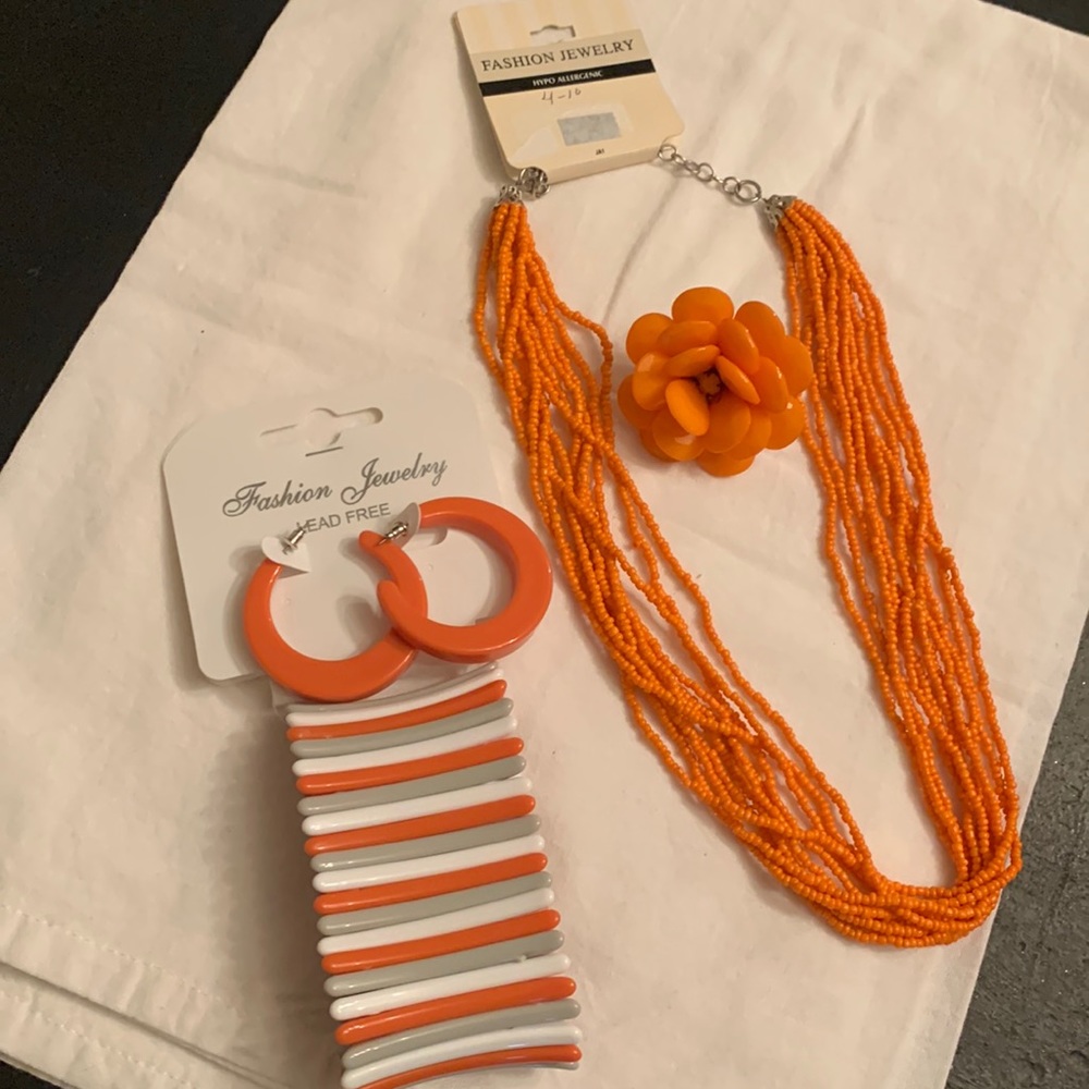 A necklace bracelet earrings and ring